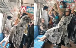 Bunda Daster Mohon Ijin Olahraga di Dalam KRL yang Sedang Berjalan